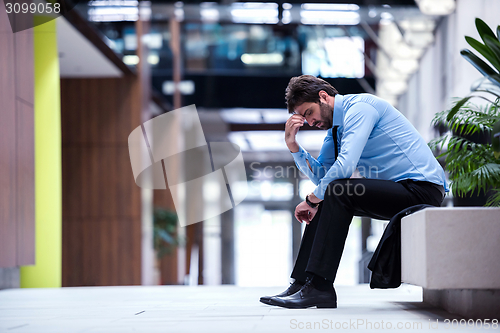 Image of frustrated young business man