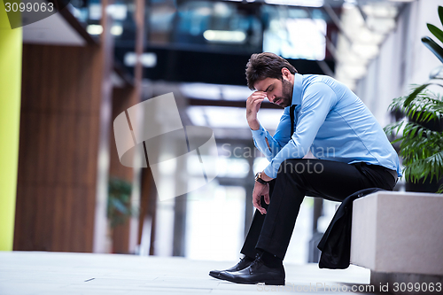 Image of frustrated young business man