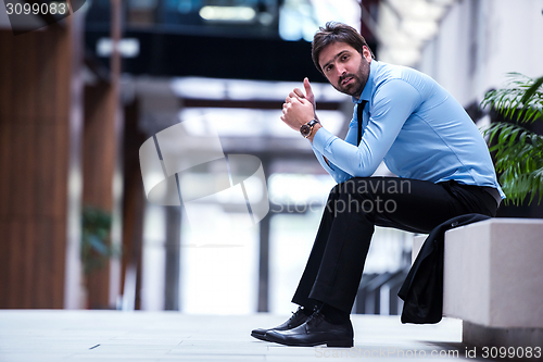 Image of frustrated young business man