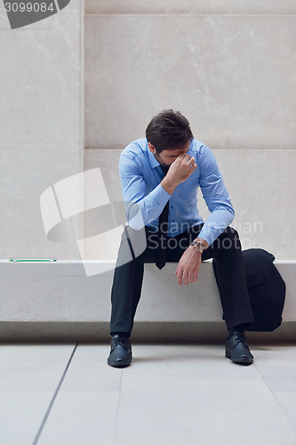 Image of frustrated young business man