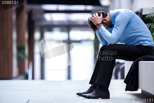 Image of frustrated young business man