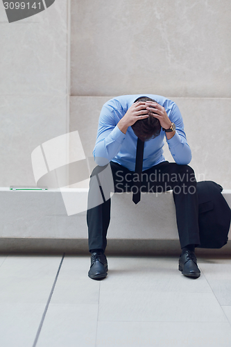 Image of frustrated young business man