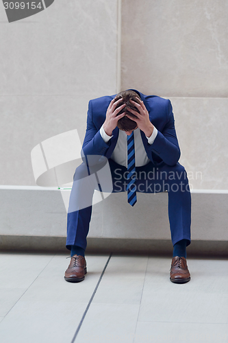 Image of frustrated young business man