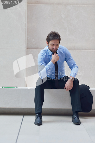 Image of frustrated young business man
