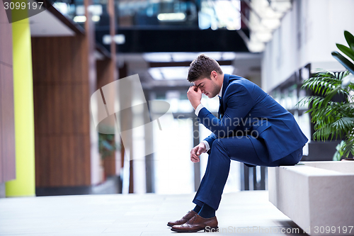 Image of frustrated young business man