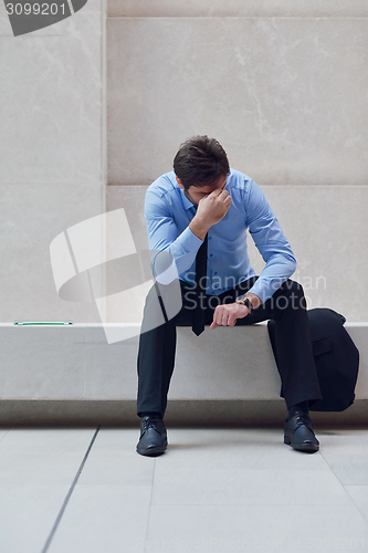 Image of frustrated young business man