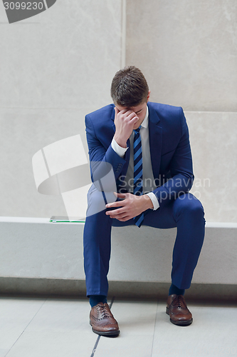 Image of frustrated young business man