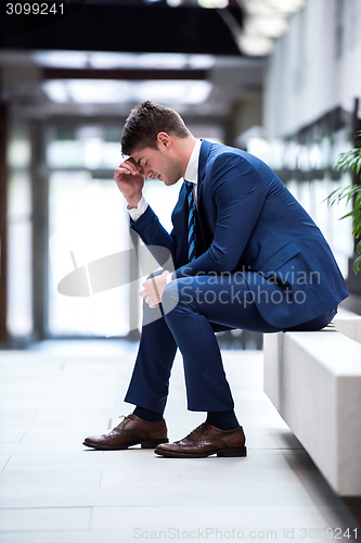 Image of frustrated young business man