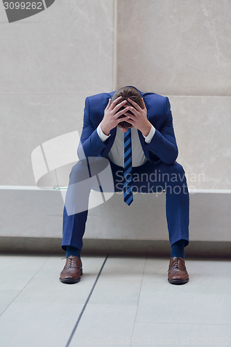 Image of frustrated young business man