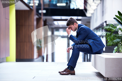 Image of frustrated young business man