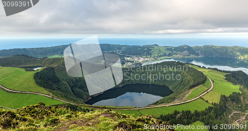 Image of Beautiful View of the Crater of the Volcano is Covered by Forest