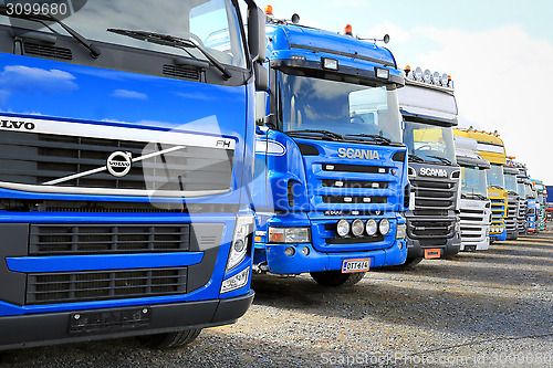 Image of Row of Colorful Truck Tractors