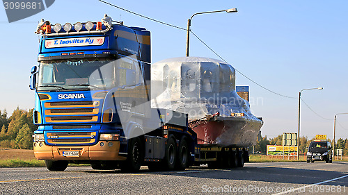 Image of Scania R500 Hauls Wide Load Accompanied by an Escort Car