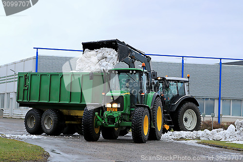 Image of John Deere 6620 Tractor and Removing Snow