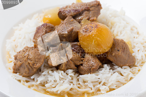 Image of Lamb fricassee with rice side view