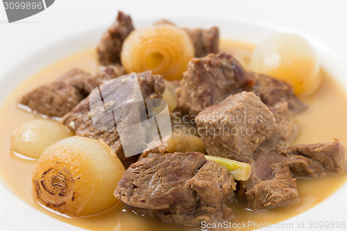 Image of Lamb fricassee with onion macro