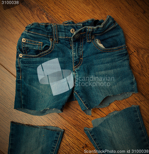 Image of cut old jeans