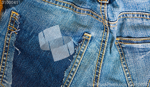 Image of cut jeans pocket