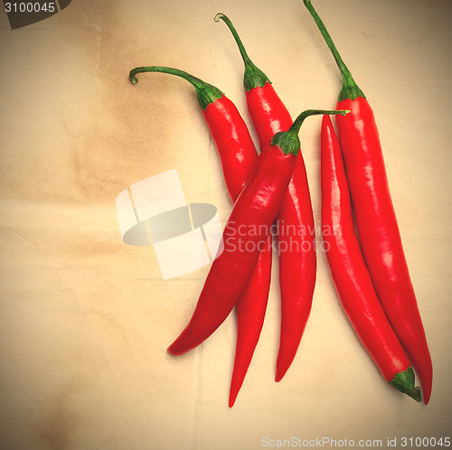 Image of chili pepper on a wooden surface