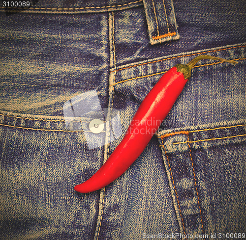 Image of hot chili peppers in a jeans