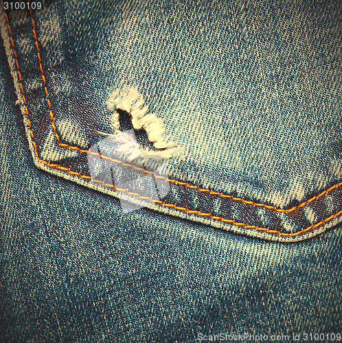 Image of jeans pocket with hole