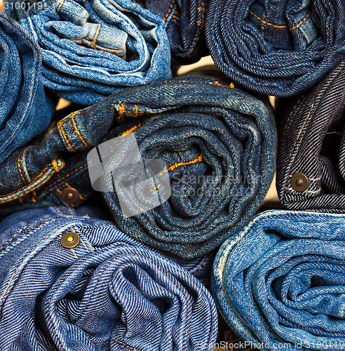 Image of jeans trousers stack