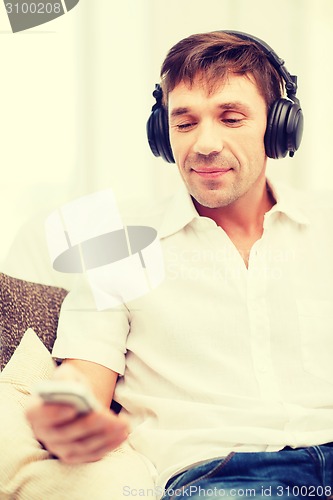 Image of man with headphones listening to music