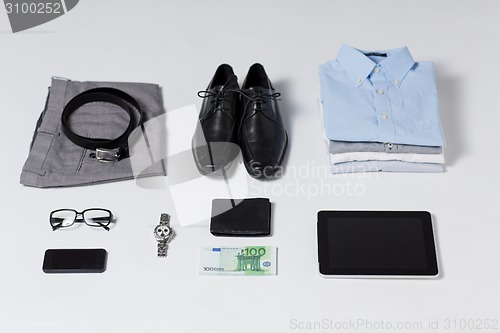 Image of close up of formal clothes and personal stuff