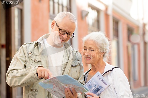 Image of senior couple on city street