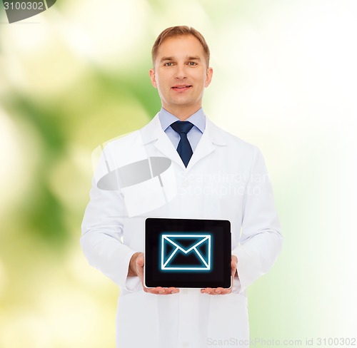 Image of smiling male doctor with tablet pc