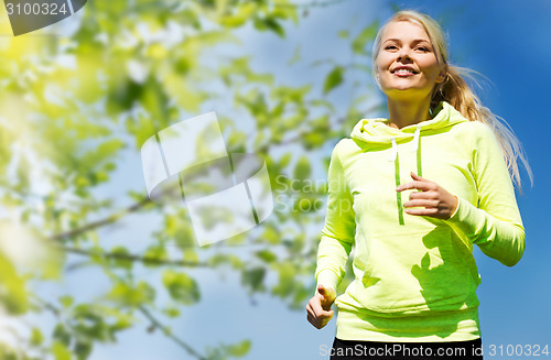Image of woman jogging outdoors