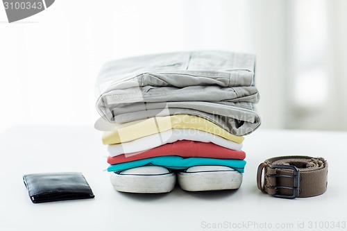 Image of close up of clothes and accessories on table