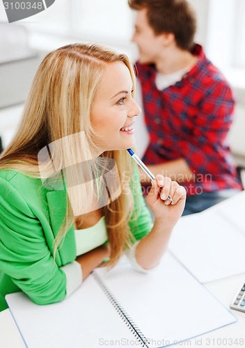 Image of student studying in college