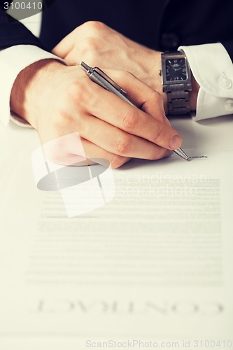 Image of man with contract