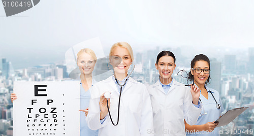 Image of smiling female eye doctors and nurses