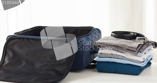 Image of close up of business travel bag and clothes