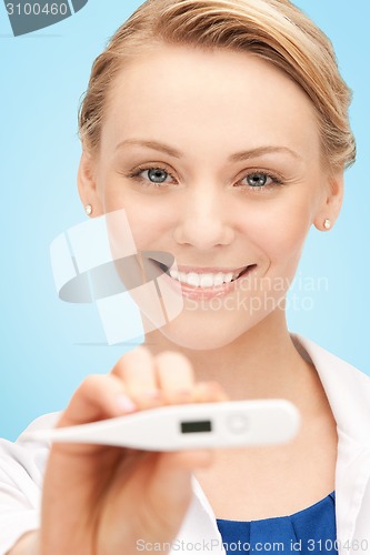 Image of happy female doctor face with thermometer