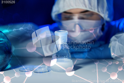 Image of close up of scientist making test in lab