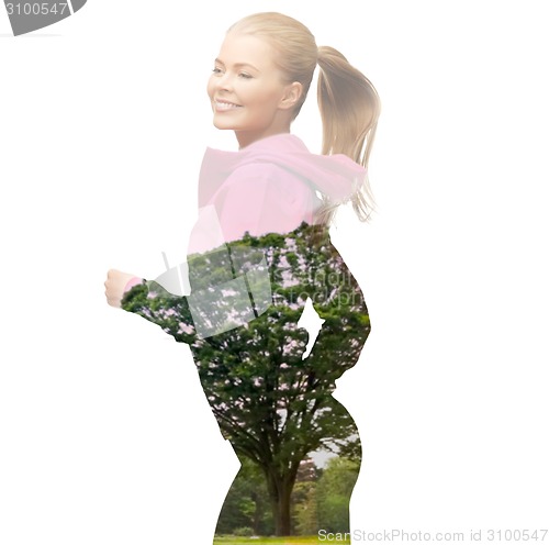 Image of happy woman running or jogging