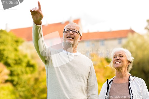 Image of senior couple in city park