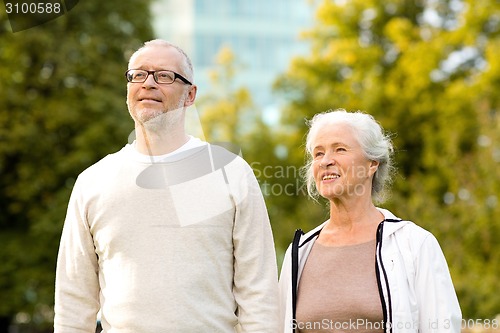 Image of senior couple in city park