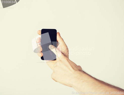 Image of man with smartphone
