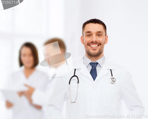 Image of smiling male doctor with stethoscope