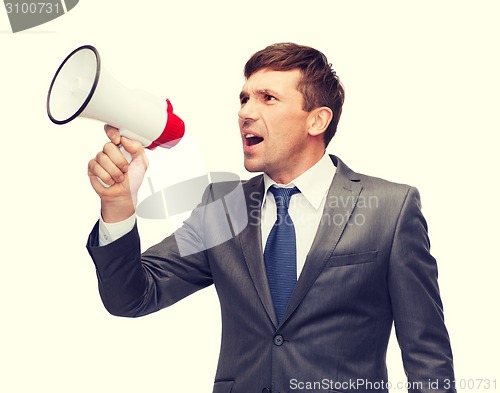 Image of buisnessman with bullhorn or megaphone