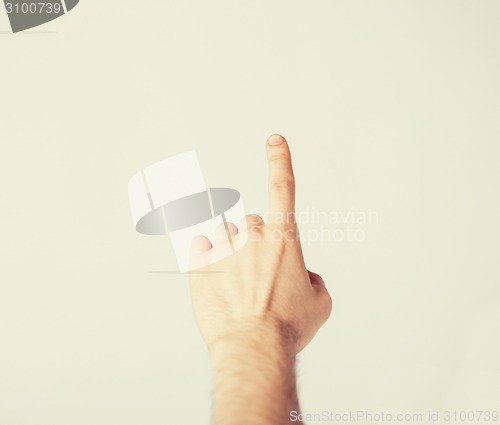 Image of man hand pointing at something