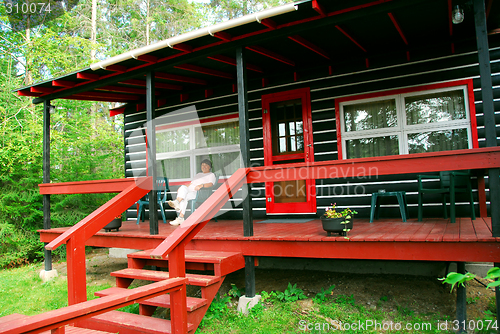 Image of Log cabin woods