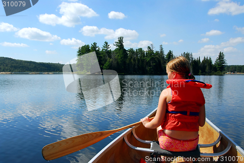 Image of Child in canoe