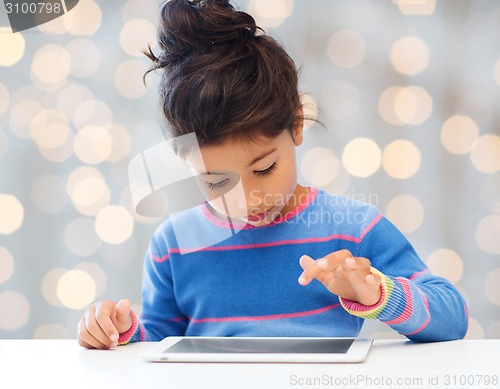 Image of little girl with tablet pc