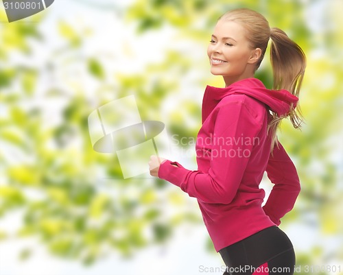 Image of happy woman running or jogging