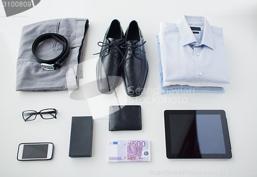 Image of close up of formal clothes and personal stuff